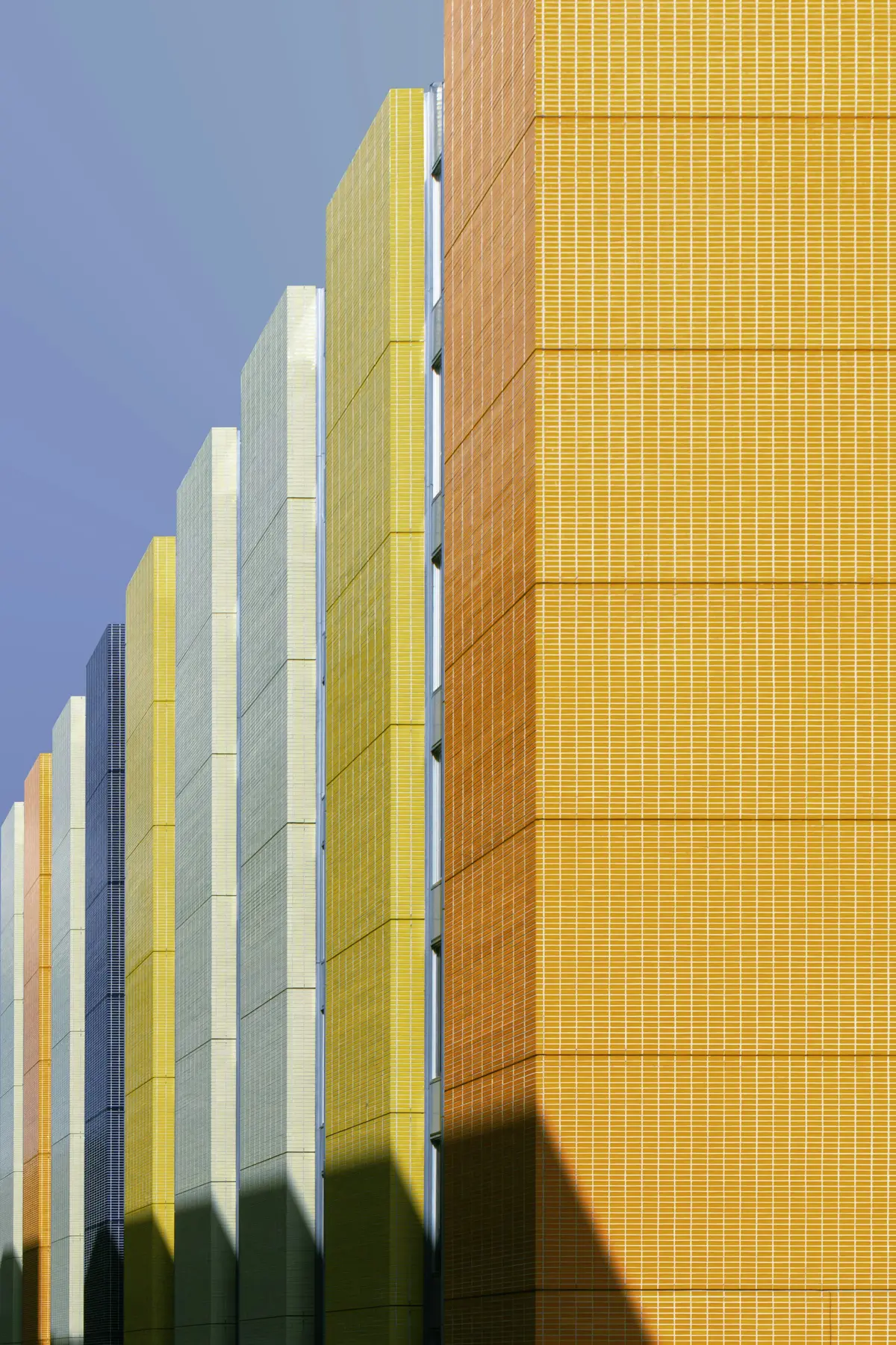 A bold yellow and gray modern building facade